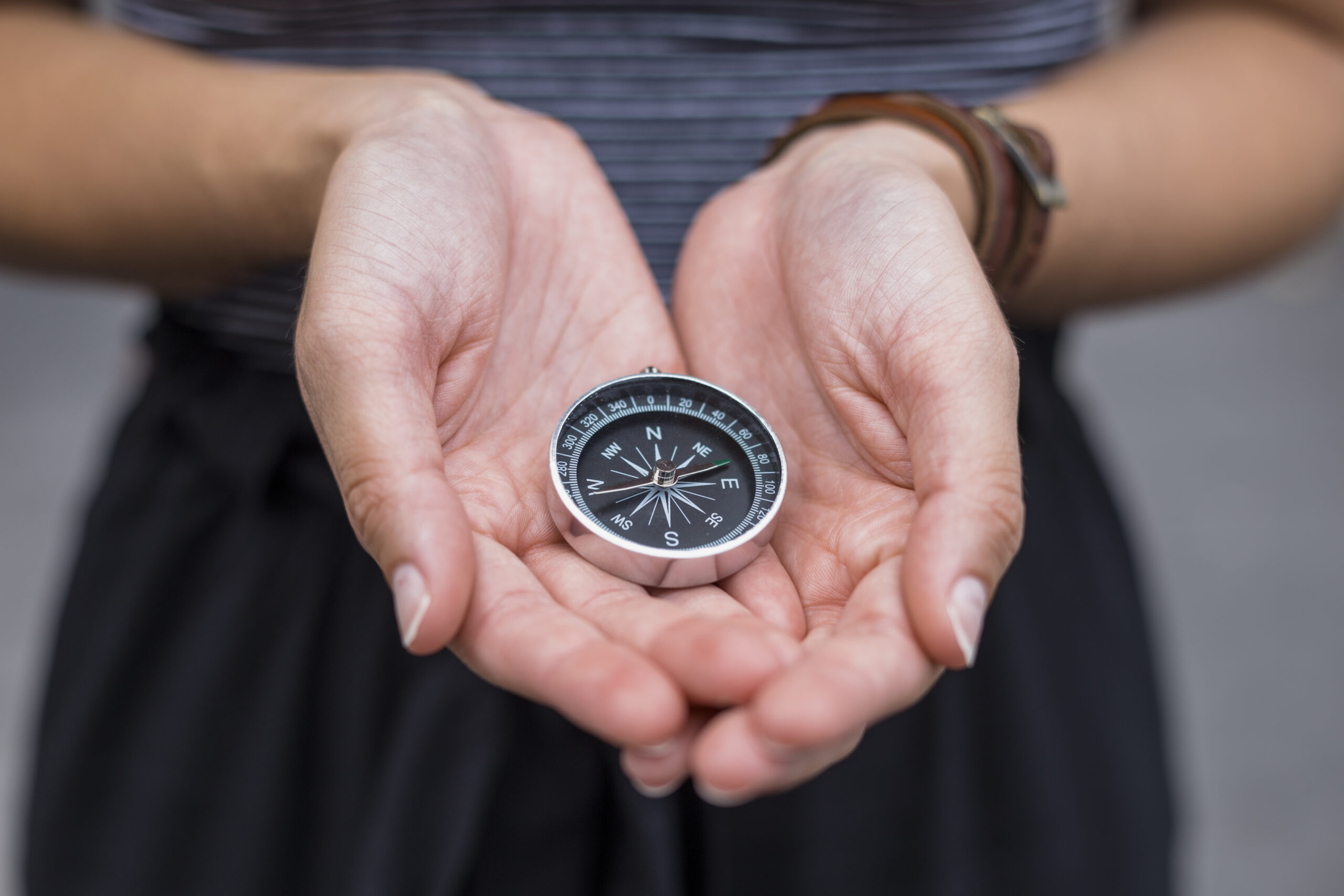 https://www.maricainnocenticounseling.com/wp-content/uploads/2024/02/female-tourist-with-compass-scaled.jpg
